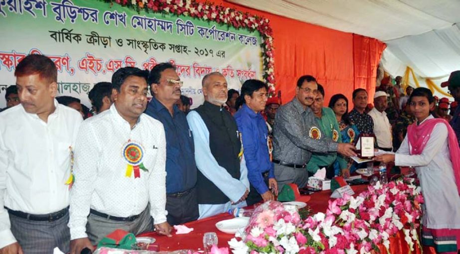 CCC Mayor A J M Nasir Uddin distributing prizes among the winners of annual sports and cultural competition of Kuraish Burichang Sheikh Mohammad City Corporation College as Chief Guest on Tuesday.
