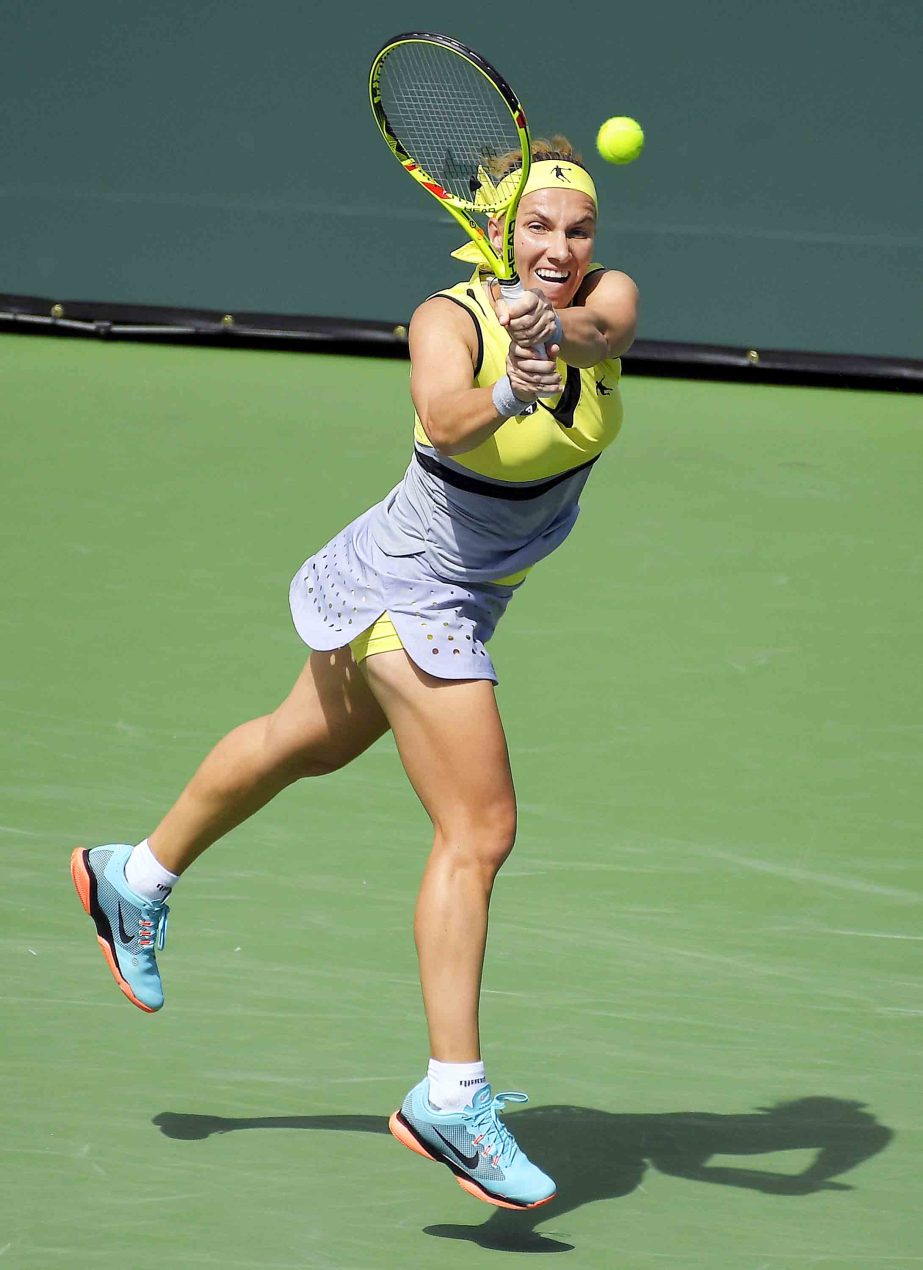 Svetlana Kuznetsova of Russia returns a shot to Anastasia Pavlyuchenkova of Russia at the BNP Paribas Open tennis tournament in Indian Wells Calif on Wednesday.