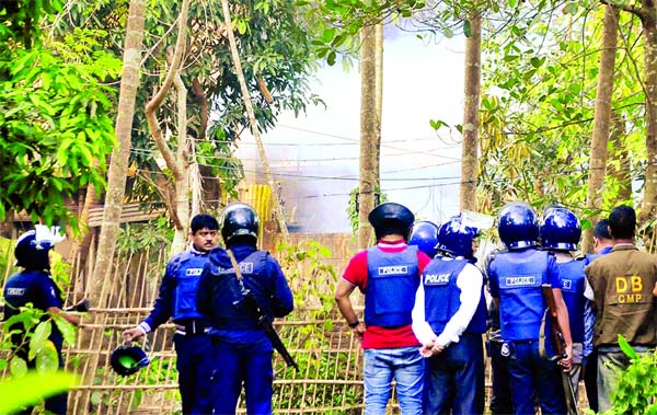 Four suspected militants and one kid were killed during special joint forces' raid on a militant den at Premtala in Sitakunda upazila of Chittagong on Thursday morning. About 24 residents being trapped inside near the den were rescued (inset top).