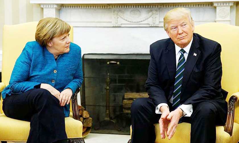 US President Donald Trump meets with German Chancellor Angela Merkel in the Oval Office at the White House in Washington on Friday.
