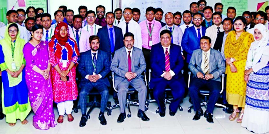 Md. Shafiul Azam, Managing Director of Modhumoti Bank Limited poses with the participants of a daylong program on "General Credit" at its Training Institute on Sunday.