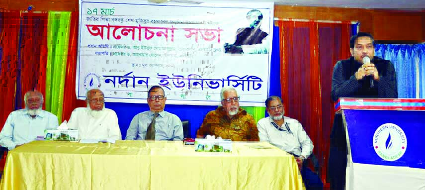 Chairman of NUB Trust Professor Dr. Abu Yousuf Md Abdullah speaking at a discussion to mark the 98th birthday of the Father of the Nation Bangabandhu Sheikh Mujibur Rahman on its Banani campus on Sunday.