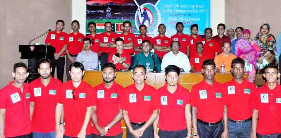 Members of Bangladesh Deaf Cricket team with the guests and officials of Bangladesh Deaf Cricket Association pose for a photo session at the Dutch-Bangla Bank Auditorium in Bangladesh Olympic Association Bhaban on Sunday.