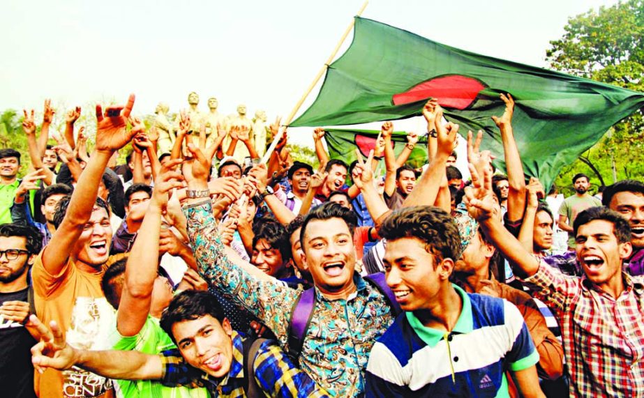 Dhaka University students celebrating victory of Bangladesh Cricket team in 100th Test match with Sri Lanka on Sunday.