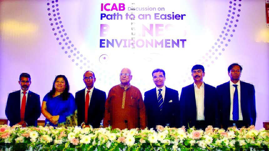 Finance Minister Abul Maal Abdul Muhith, poses with the discussants of a view exchange program organized by the Institute of Chartered Accountants of Bangladesh (ICAB) in the city recently. Kazi M Aminul Islam, Executive Chairman, Bangladesh Investment De