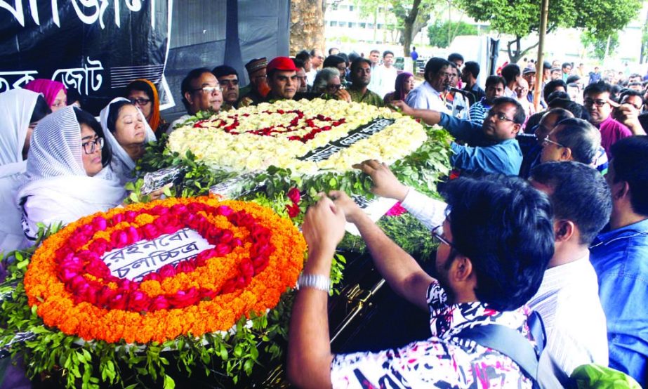 People from all walks of life paying last respect to former Foreign Secretary Mijarul Quayes by placing wreaths on his coffin at the Central Shaheed Minar in the city on Monday.