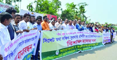 SYLHET: Asad Uddin Ahmed, General Secretary, Sylhet City Awami League speaking at a human chain protesting drug abuses, gambling and other illegal anti-social activities organised by Haji Tofayel Ahmed Trust at Markaj point on Sunday.