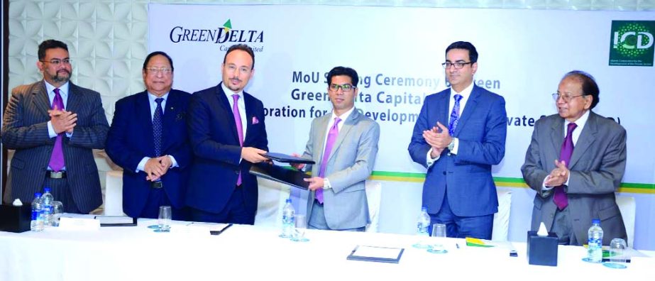 Farid Masmoudi, Director of Direct Investments and Financing Department and Member of the Management Committee of ICD and Md Rafiqul Islam, Managing Director and CEO of Green Delta Capital Limited sign an MoU to implement financial transactions in Banglad