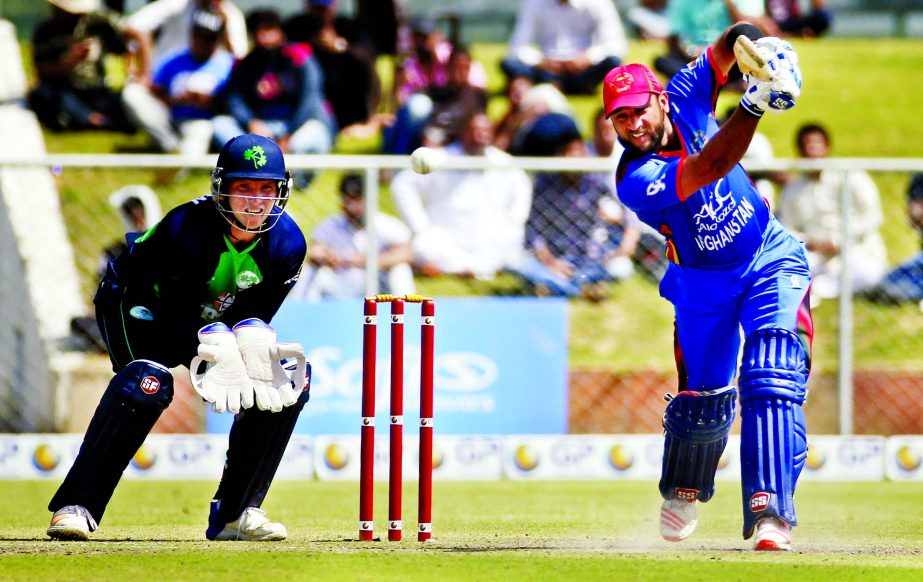 Afghanistan's Shafiqullah plays a shot during their fourth One Day International cricket match against Ireland in Greater Noida, India on Wednesday.