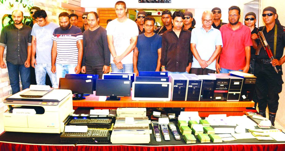 RAB arrested 9 persons for their alleged involvement in human trafficking from near HSIA area on Wednesday. Some equipment used to produce forged passports, visas and cash were seized from them.