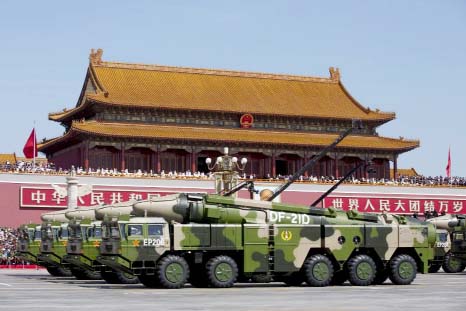 Military vehicles carry DF-10 ship-launched cruise missiles as they travel past Tiananmen Gate during a military parade to commemorate the 70th anniversary of the end of World War II in Beijing on Thursday.