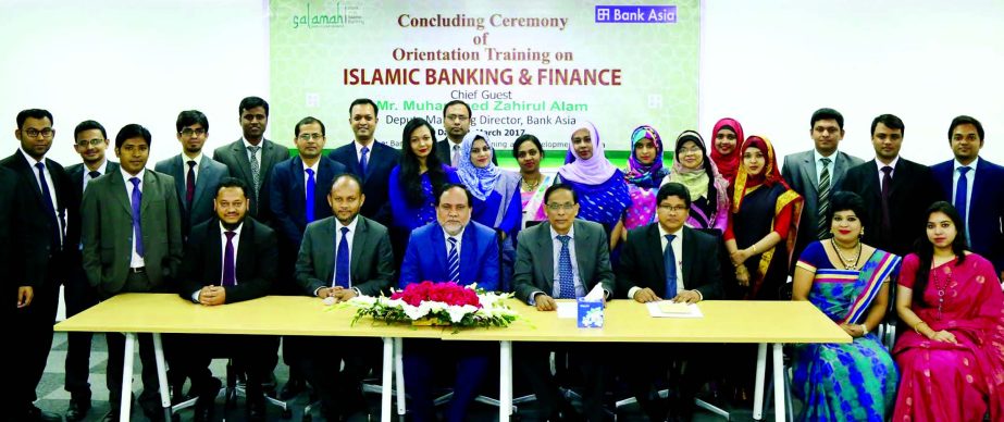 Mohammed Zahirul Alam, Deputy Managing Director of Bank Asia Ltd, poses with the participants of an orientation program on Islamic Banking and Finance at the bank's Institute for Training & Development at Lalmatia in the city recently. AKM Mizanur Rahman