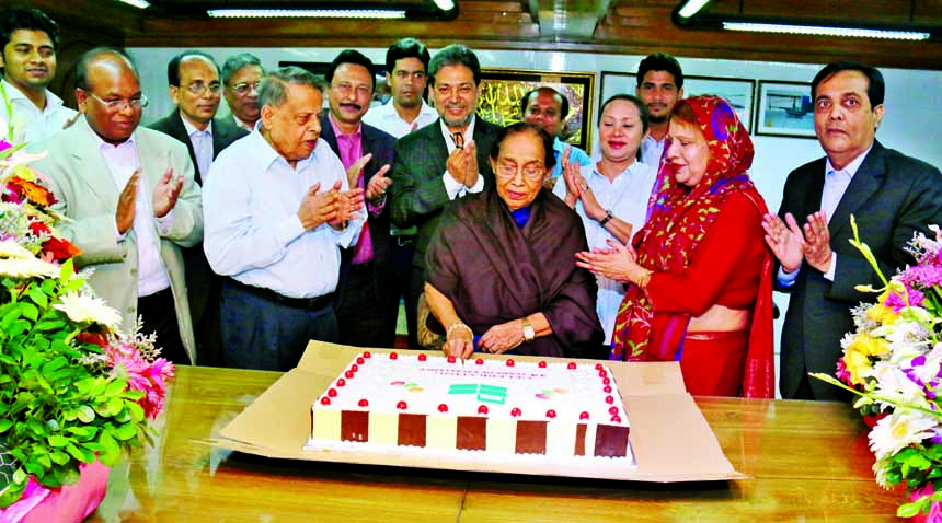 Zainul Haque Sikder, Chairman and Monowara Sikder, Director of National Bank Limited, celebrating 34th anniversary of the bank at its head office on Thursday. high official of the bank were present.