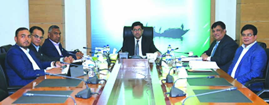 Barrister Sheikh Fazle Noor Taposh MP, EC Chairman of Modhumoti Bank Limited, presiding over its 54th EC meeting at the bank's head office.