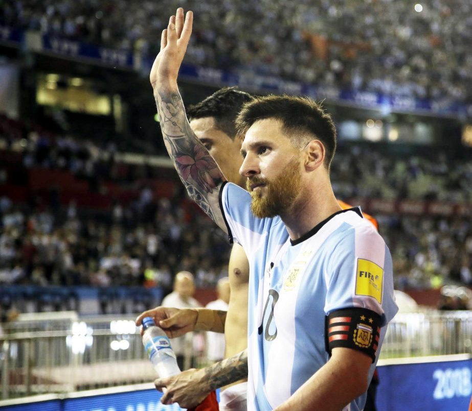 Argentinaâ€™s Lionel Messi greets the crowd as he leaves the pitch after a 2018 Russia World Cup qualifying soccer match between Argentina and Chile at the Monumental stadium in Buenos Aires, Argentina, Thursday March 23, 2017. Argentina won the mat