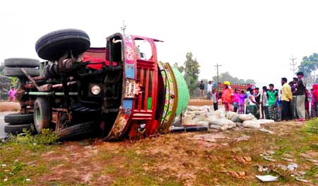 Five of a family among 10 were killed while a goods laden truck overturned on Dhak-Mymensingh Highway at Meherbari area of Bhaluka on Friday.