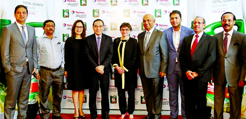 French Ambassador to Bangladesh Sophie Aubert, attends the launching ceremony of Total Quartz 3500 Super engine oil at a city hotel on Saturday. Md Abul Khair, Managing Director of Padma Oil Company Limited, Pai Kok Tan, Vice President of Total Oil Asia P