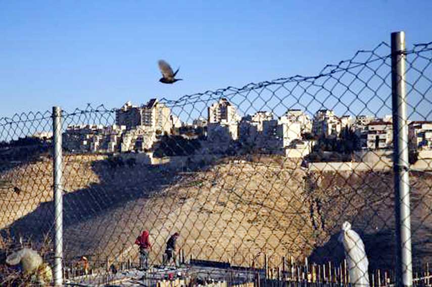 Palestinian labourers work at a construction site in a new housing project in the Israeli settlement of Maale Adumim, near Jerusalem.