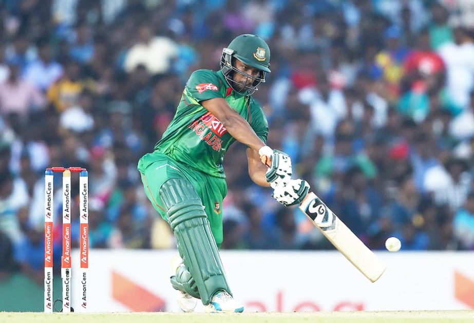 Shakib Al Hasan plays a shot during the first one day international (ODI) cricket match between Sri Lanka and Bangladesh at the Rangiri Dambulla International Cricket Stadium in Dambulla on Saturday.