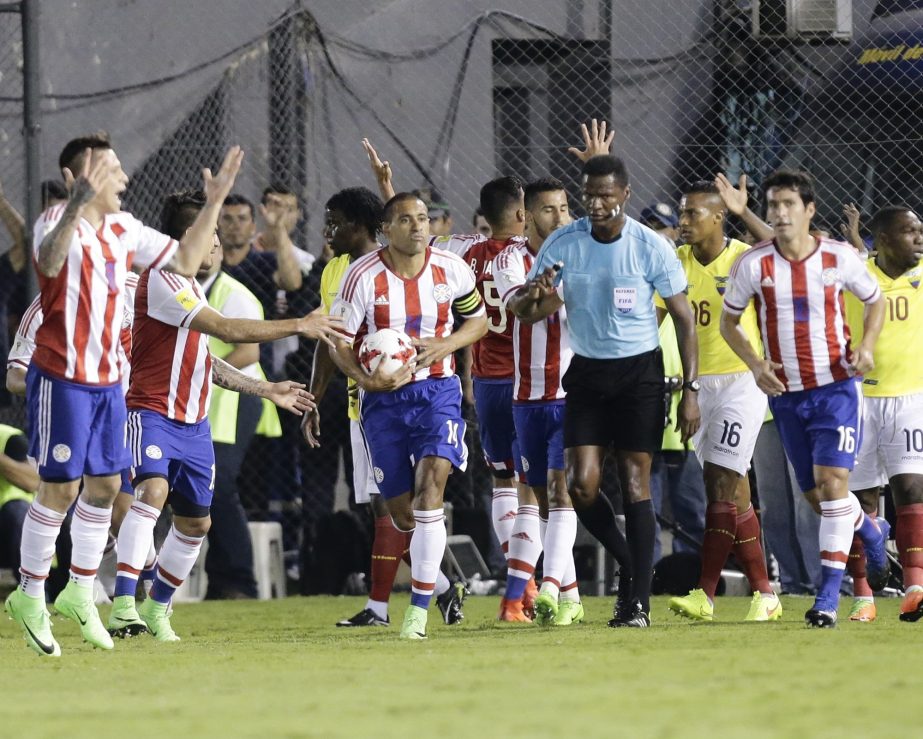 Paraguay's Paulo Da Silva (center) and teammates celebrates their first goal scored by Bruno Valdez against Ecuador during a 2018 World Cup qualifying soccer game in Asuncion, Paraguay on Thursday.