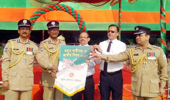 Md Ruhul Amin, Divisional Commissioner, Chittagong inaugurating parade at Padage ground near Chittagong College as Chief Guest organised by Chittagong District Administration on Sunday.