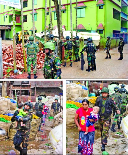 The anti-militant assault operation led by para-commando battalion of Bangladesh Army continued for the fourth consecutive day on Monday at Atia Mahal of Shibbari in Sylhet [top]. A commando is seen taking a child to a safe place after rescuing the baby f