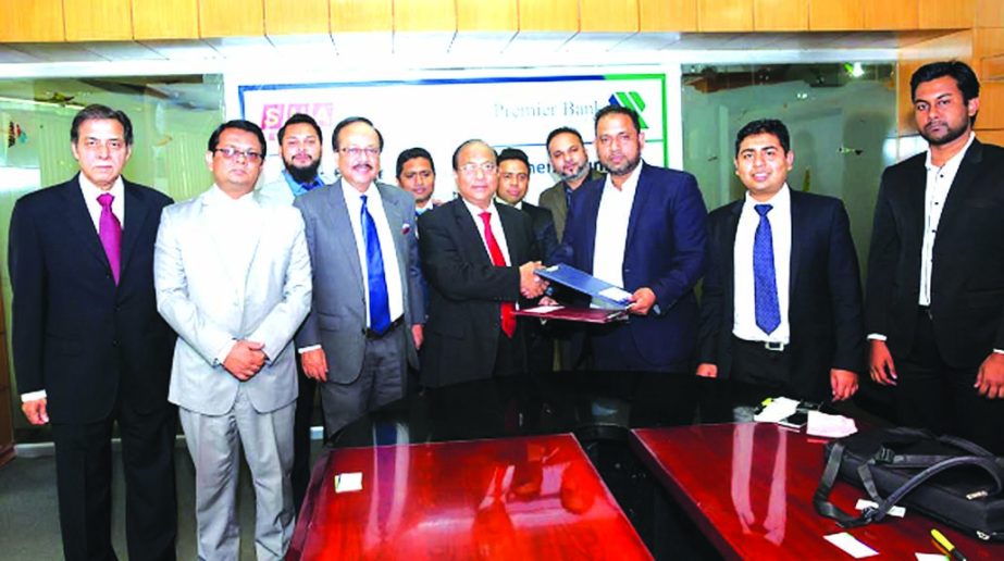 Khondker Fazle Rashid, Managing Director of Premier Bank Limited and Sanam Mia, Chief Executive Officer of Sha Global, UK, inks a deal on remittance drawing in the city recently.