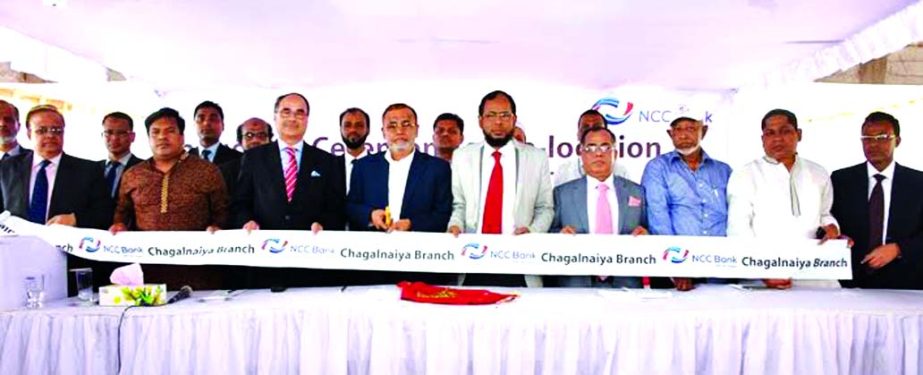 Md Nurun Newaz Salim, Chairman of Risk Management Committee of NCC Bank Ltd, inaugurating its relocated branch at Chhagalnaiya Sadar, Feni on Monday. Khairul Alam Chaklader, Director, Golam Hafiz Ahmed, Managing Director, AZM Saleh, DMD of the bank and Me