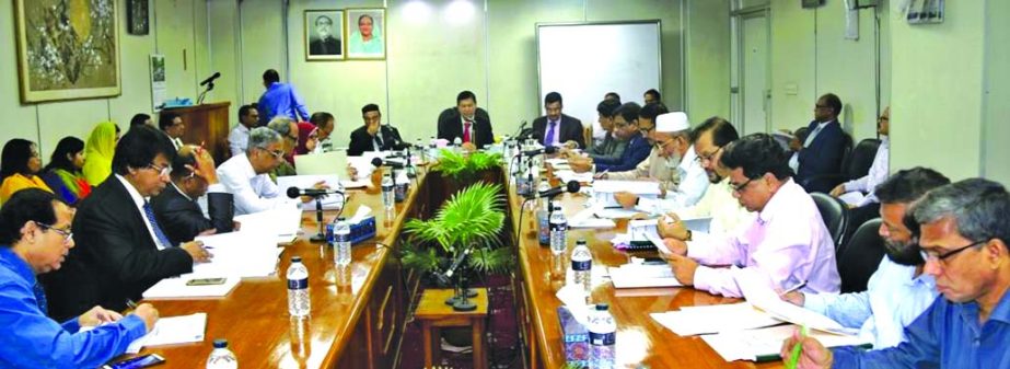 Md. Ashraful Mokbul, Chairman of Sonali Bank Limited, presiding over its Managing Committee meeting at the bank's head office on Wednesday. Md. Obayedullah Al Masud, Managing Director of the bank was present.