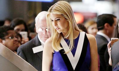 Ivanka Trump touches a piece of moon rock at an exibit at the Smithsonianâ€™s National Air and Space Museum in Washington..