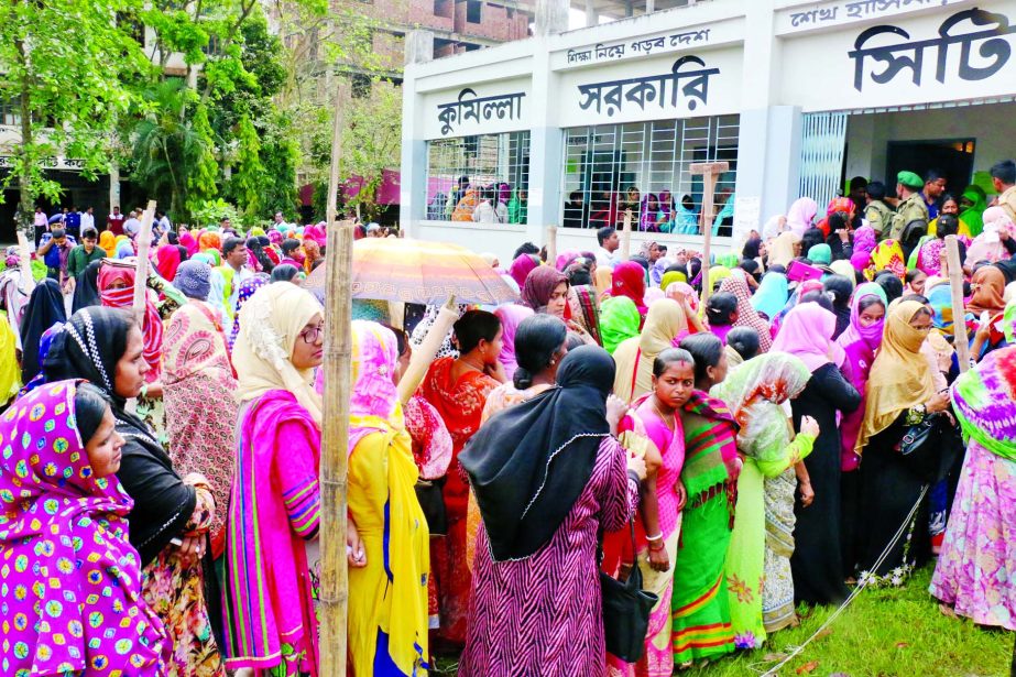 Voters are in long queue to cast their votes in Comilla City Corporation election. This photo was taken from Comilla Government City College Centre on Thursday.