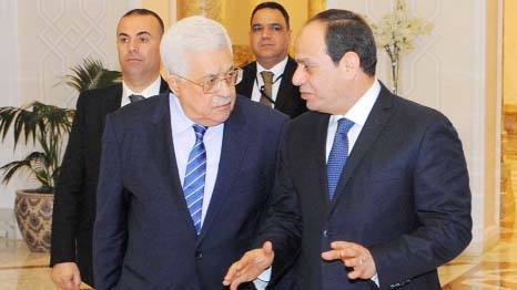 Egyptian President Abdel Fattah al-Sissi Â® meeting with Palestinian president Mahmud Abbas at the presidential palace in Cairo.