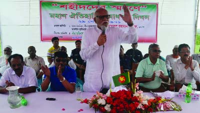 PABNA: Land Minister Shamsur Rahman Sharif speaking as Chief Guest at a remembrance meeting of 17 shaheed freedom fighters on the day of first resistance of Pakistan occupation forces at Madabpur in Pabna recently.