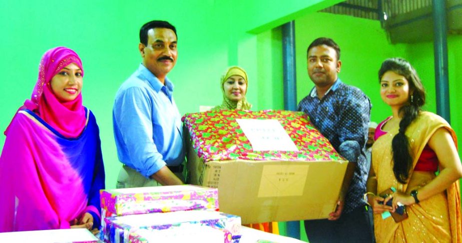 Aminul Islam, Chairman of Amin Trading and Testing Center Bangladesh, distributing raffle draw prize among the media representative from several district at the company head office in the city recently.