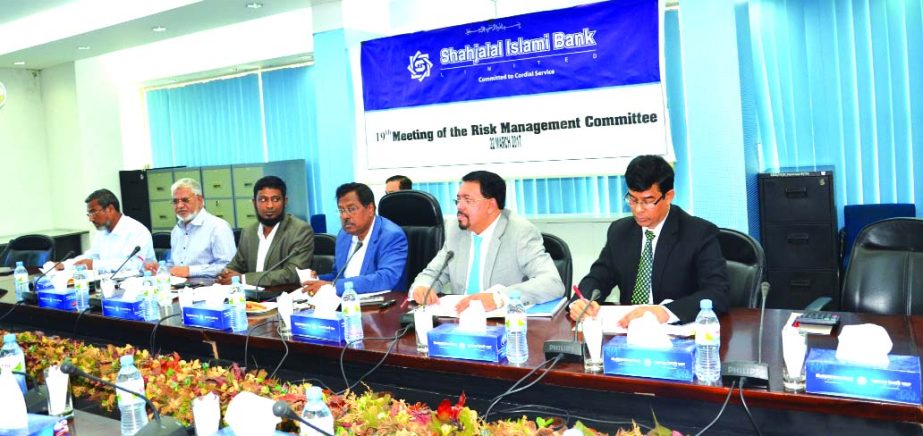 Mohammad Younus, Chairman, Risk Management Committee and Director of Shahjalal Islami Bank Limited presiding over its 19th meeting at the bank head office in the city recently. Mohiuddin Ahmed, Khandoker Sakib Ahmed, Md. Abdul Barek, Directors and Farman