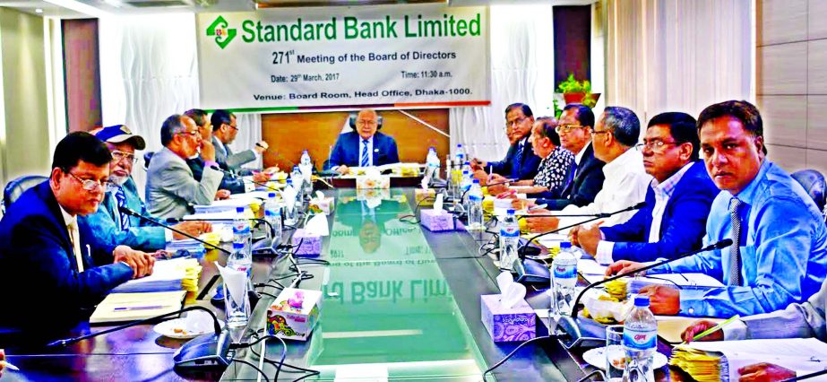 Kazi Akram Uddin Ahmed, Chairman, Board of Directors of Standard Bank Ltd, presiding over its 271st Board Meeting at the banks head office in the city recently. SAM Hossain, Vice Chairman, Kamal Mostafa Chowdhury, Ferozur Rahman, Mohammed Abdul Aziz, Dire