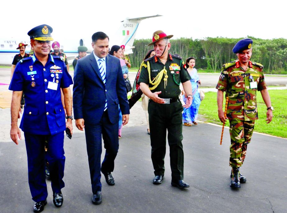 Indian Army Chief General Bipin Rawat being received by Logistics Area Commander of Bangladesh Army Major General Ataul Hakim Sarwar Hasan at Bangladesh Air Force Base Bangabandhu, Kurmitola on Friday.