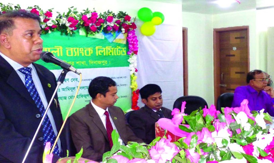 Hari Bhusan Deb, Deputy General Manager of Rangpur Region of Pubali Bank Ltd, delivering speech at the inauguration ceremony of its Parbatipur Branch in Dinajpur on Saturday. AZM Rezwanul Haque, Former Mp and Sahin Mamtaz, Assistant General Manager of the