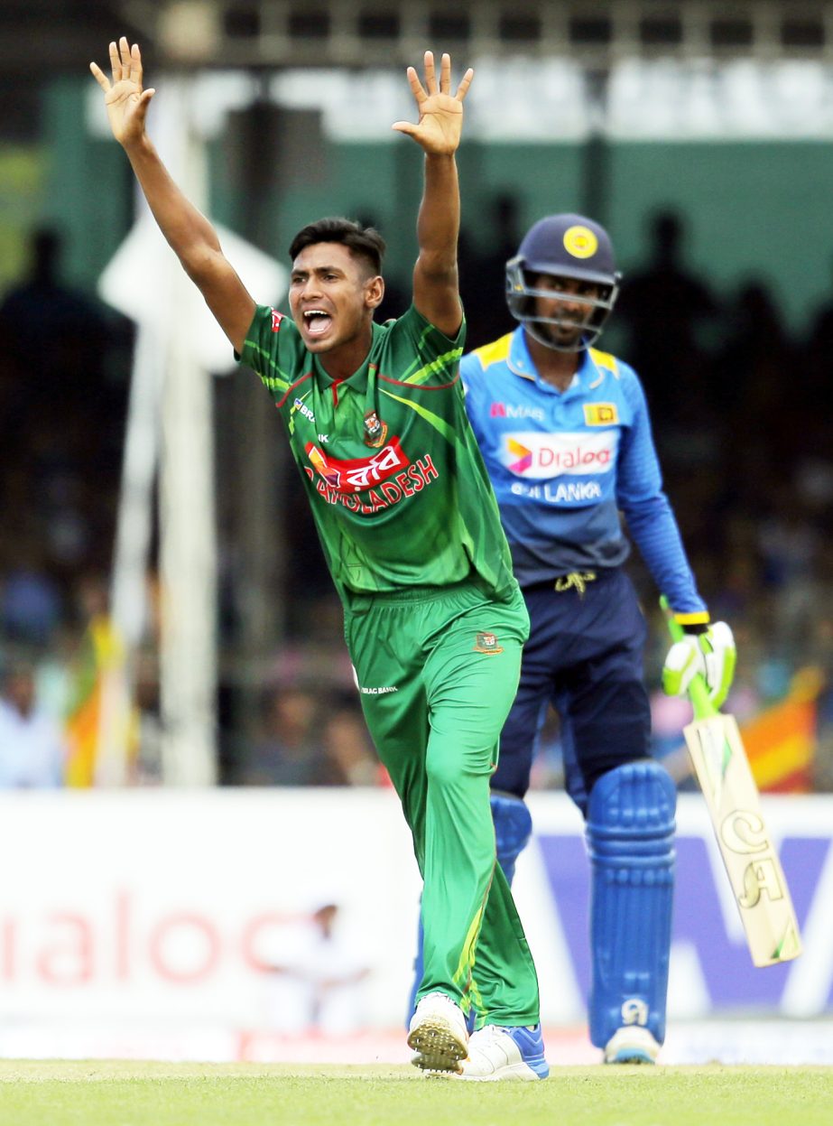 Mustafizur Rahman unsuccessfully appeals for the wicket of Sri Lanka's Upul Tharanga (right) during their third One-Day International cricket match in Colombo, Sri Lanka on Saturday.