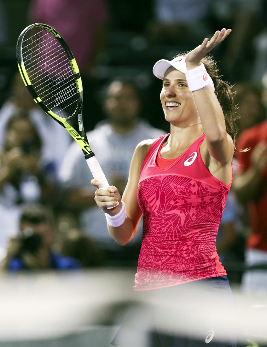 Johanna Konta of Britain waves to the crowd after defeating Venus Williams of the United States, 6-4, 7-5 during a semifinal at the Miami Open tennis tournament on Thursday in Key Biscayne, Fla.