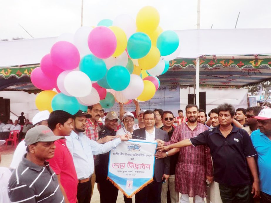 Managing Director and CEO of IFIC Bank Limited Shah Alam Sarwar inaugurating the IFIC Bank National Beach Volleyball (Men's & Women's) Competition by releasing the balloons as the chief guest at the Sugandha Beach in Cox's Bazar on Friday.