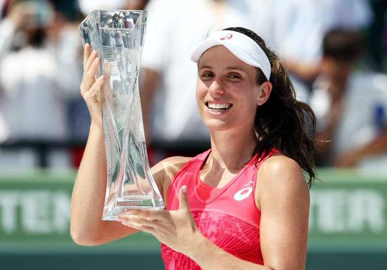 Britain's Johanna Konta celebrates with the trophy after defeating Caroline Wozniacki in the final of the Miami Open.
