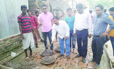 TRISHAL(Mymensingh): A B M Anis-uz- Zaman, Mayor, Trishal Pourashava inaugurating repair work of Nazrul College Pukur Par Road on Sunday.