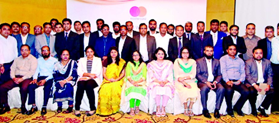Gitanka D Datta, Vice President, Mastercard, Bangladesh poses with the participants of a Workshop on Mastercard Fraud Rule Manager & Expert Monitoring System at a city hotel in recently.
