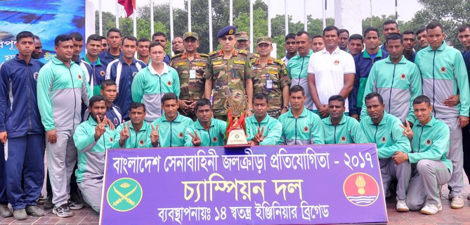 Members of 66 Infantry Division team, the champions of Bangladesh Army Synchronize Swimming Competition with the chief guest Engineering-in-Chief of Bangladesh Army Major General Md Siddiqur Rahman Sarker pose for a photo session at Army Swimming Complex
