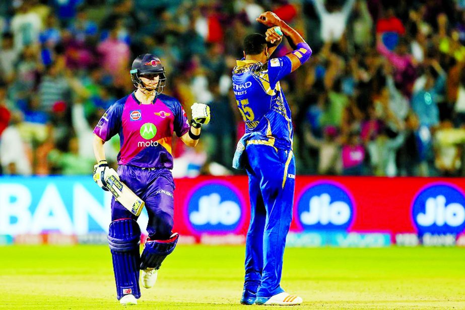 Steven Smith punches the air after hitting back-to-back sixes for victory during the IPL match between Rising Pune Supergiant and Mumbai Indians at Pune on Thursday.