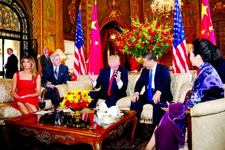 US President Donald Trump and First Lady Melania Trump welcome Chinese President Xi Jinping and first lady Peng Liyuan at Mar-a-Lago estate in Palm Beach, Florida.