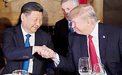 US President Donald Trump meets Chinese President Xi Jinping at Mar-a-Lago resort in Palm Beach, Florida.