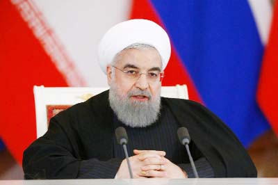 Iranian President Hassan Rouhani speaks during a joint press conference with his Russian counterpart Vladimir Putin following their meeting at the Kremlin in Moscow