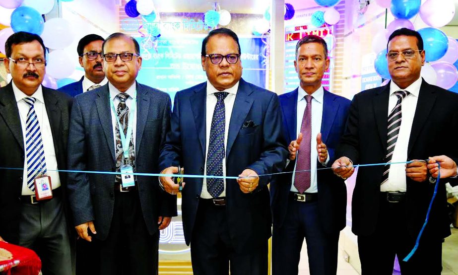 Shaikh Md Wahid-uz-Zaman, Chairman of Janata Bank Limited, inaugurating a foreign currency selling counter of the bank at Hazrat Shah Jalal International Airport on Saturday. Md Abdus Salam, FCA, MD, Md Abdus Salam Azad, DMD and Md Abdul Awal, GM of the b